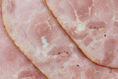A close view of several slices of Virginia baked ham.の写真素材