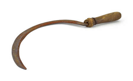 Vintage hand sickle on a white background.の写真素材
