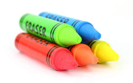 Five colorful erasers on a white background.の写真素材