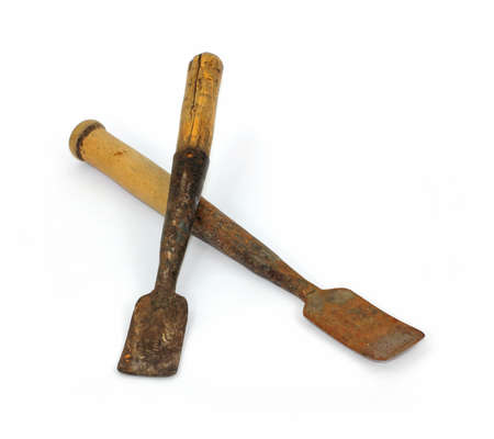 A pair of old log peeling tools on a white background.