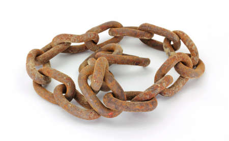 Several links of a rusty old chain on a white background.の写真素材