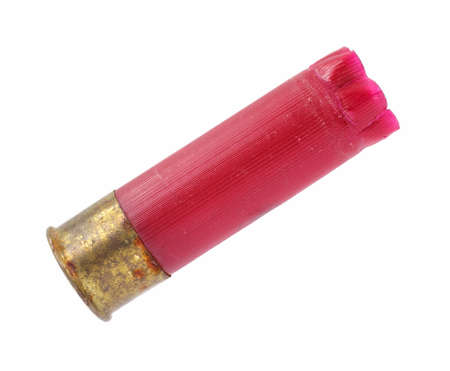 A red shotgun casing that has been fired on a white background.