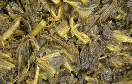 A very close view of cooked mustard greens.