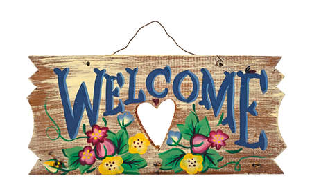 An old wood folk art Welcome sign on a white background の写真素材