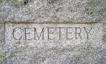 A very old granite block with Cemetery chiseled in bold lettering の写真素材