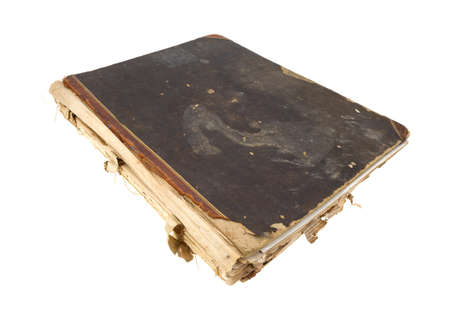 A very old scrapbook that is falling apart on a white background の写真素材