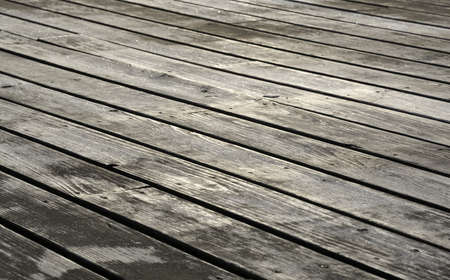 A large wood deck that has been grayed and weathered の写真素材