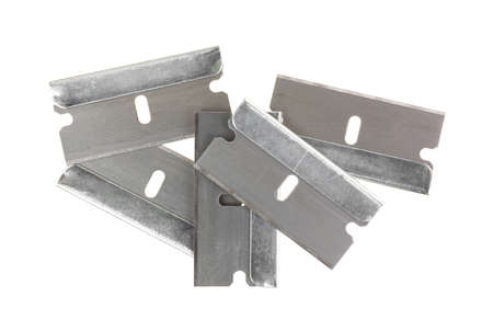 A group of new razor blades on a white background.