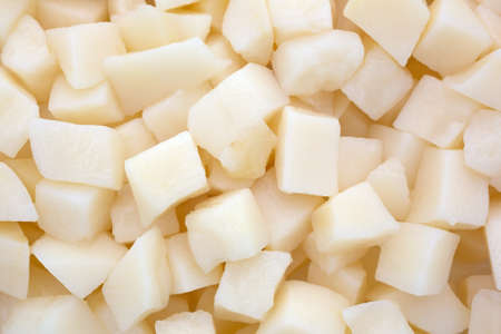A very close view of freshly diced white potatoes の写真素材