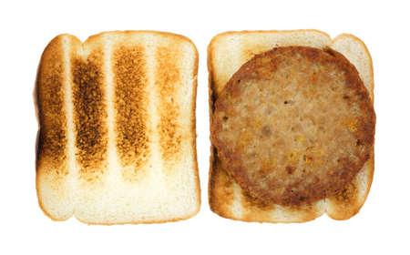 A vegetable burger patty on toasted bread 