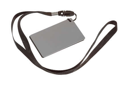 A used gray card on a lanyard atop a white background.の写真素材