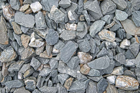 A very close view of gravel used between railroad ties 