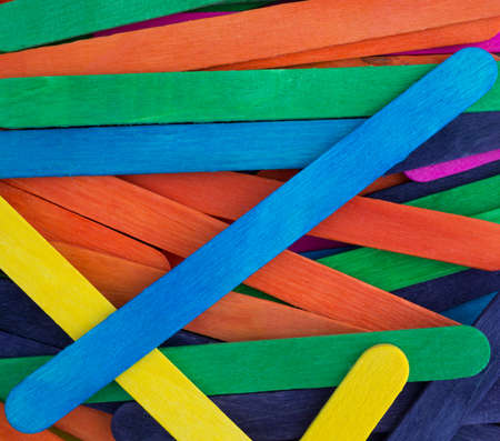 A close view of colorful craft sticks.の写真素材