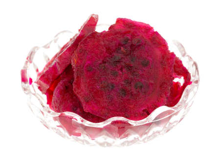 A small bowl filled with slices of prickly pear cactus on a white background.の写真素材