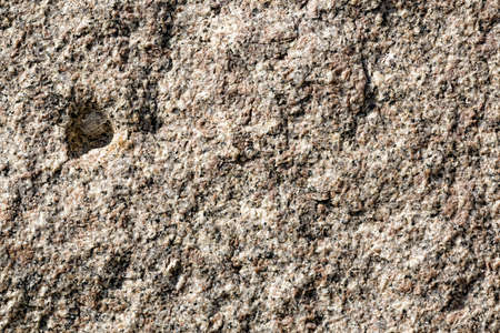 A close view of the face of a cut granite stone used for breakwater.の写真素材