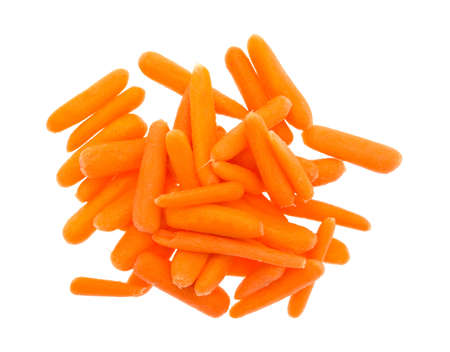 Top view of a group of organic small baby carrots isolated on a white background.の写真素材