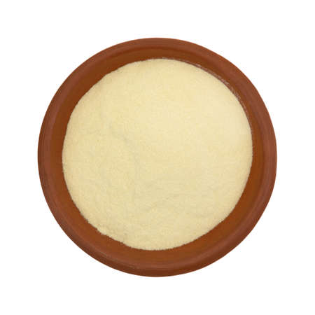 Top view of a portion of gluten free xanthan gum in a small bowl isolated on a white background.の写真素材