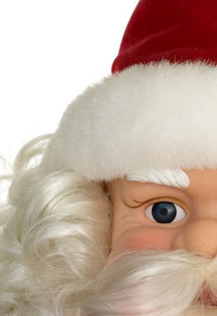 A partial view of an old Santa Claus plastic doll face decoration with hat and beard.の写真素材