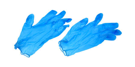 A pair of new blue latex protective gloves isolated on a white background.