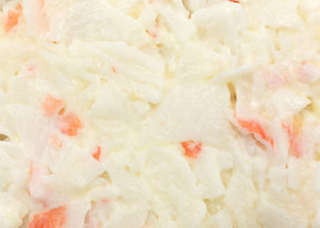 A very close view of surimi crab meat made into a salad with mayonnaise.の写真素材