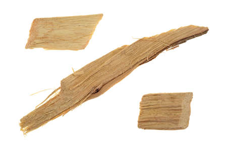 Three hickory wood smoking chips for flavoring barbecue and grilled foods isolated on a white...