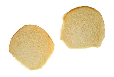 Top view of a white bread sesame seed hamburger bun open isolated on a white background.