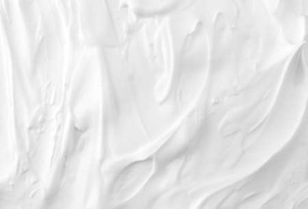 Close view of thick shaving foam illuminated with natural light.の写真素材