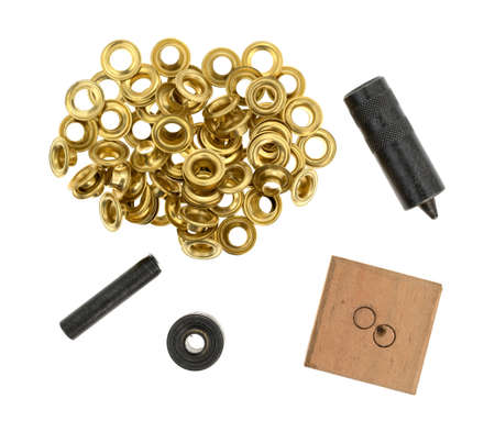 Used grommet kit isolated on a white background.