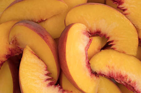 A very close view of nectarine slices.の写真素材