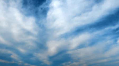 Gathering storm clouds forming in the sky.