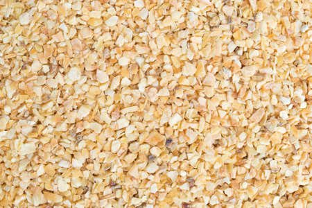 A close view of dried minced garlic.の写真素材