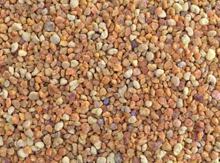 A very close view of organic bee pollen granules.