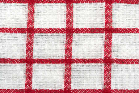 Close view of red and white pattern dish cloth.の写真素材