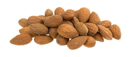 A serving of raw natural almonds isolated on a white background.の写真素材