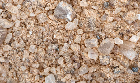 A very close view of sand and salt mixed for deicing and sanding roads in the wintertime. の写真素材