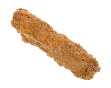 Top view of a baked crunchy cinnamon twisted cookie isolated on a white background.の写真素材