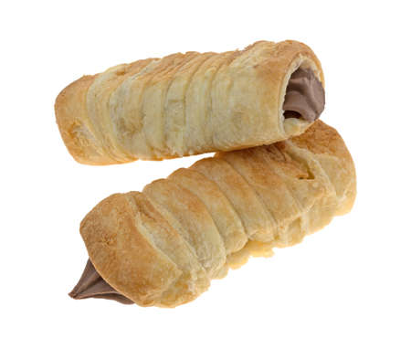 Two chocolate creme horns isolated on a white background.