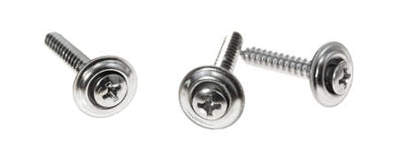 Three stainless steel trim head screws isolated on a white background.