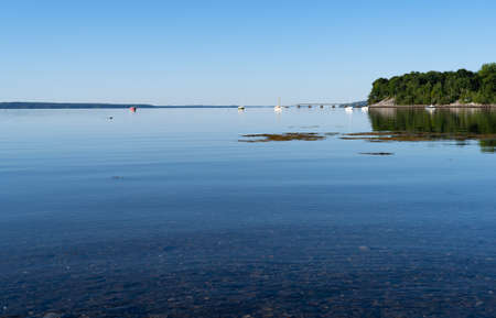 View of Penobscot Bay from the shore at  Searsport, Maine in the early morning light.