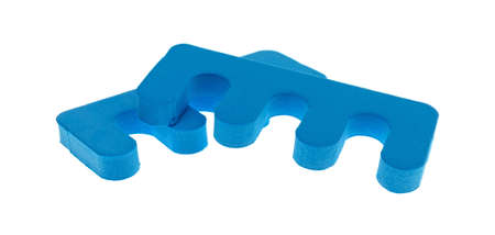 Side view of two toe separators used for toenail polish isolated on a white background.