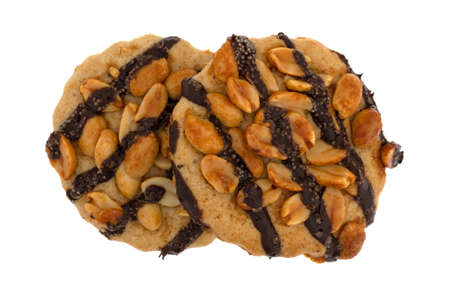 Top view of two chocolate striped peanut cookies isolated on a white background.の写真素材
