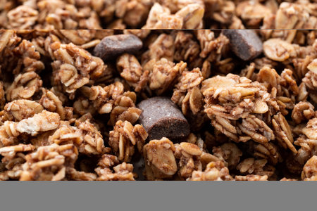 Side close view of a portion of chocolate chunk granola.の写真素材