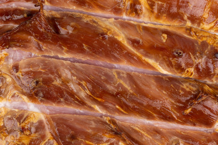 Very close view of a perfectly cooked ham.の写真素材