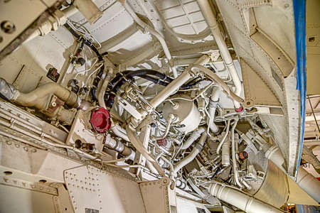 The complex machinery the makes up the landing gear for a jet airplane