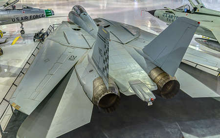 F18 fighter jet far from any carrier lives out retirement resting in a hangerのeditorial素材