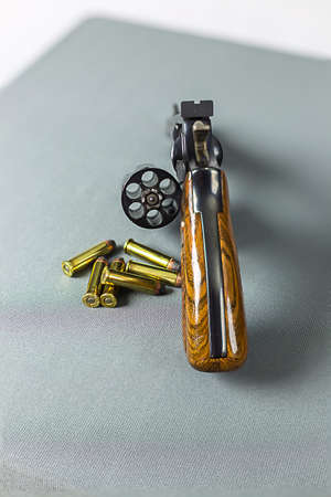 Revolver cylinder open for ammo with bullets ready.の写真素材
