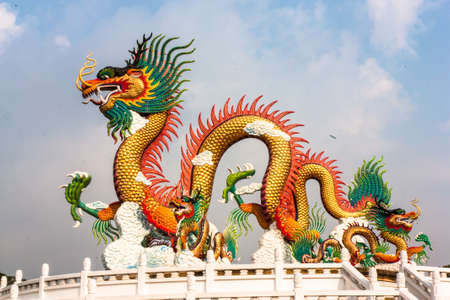 Golden dragon at Nakornsawan province in the morning nightの写真素材