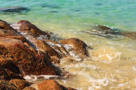 blue sea and rocks at Mon-nok island, Ra-yong, Thailand.の写真素材