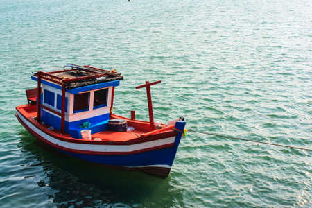 Littel boat was sailing on blea after had work alreadyの写真素材