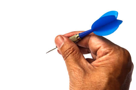 Arrow darts in hand isolated on white backgroundの写真素材